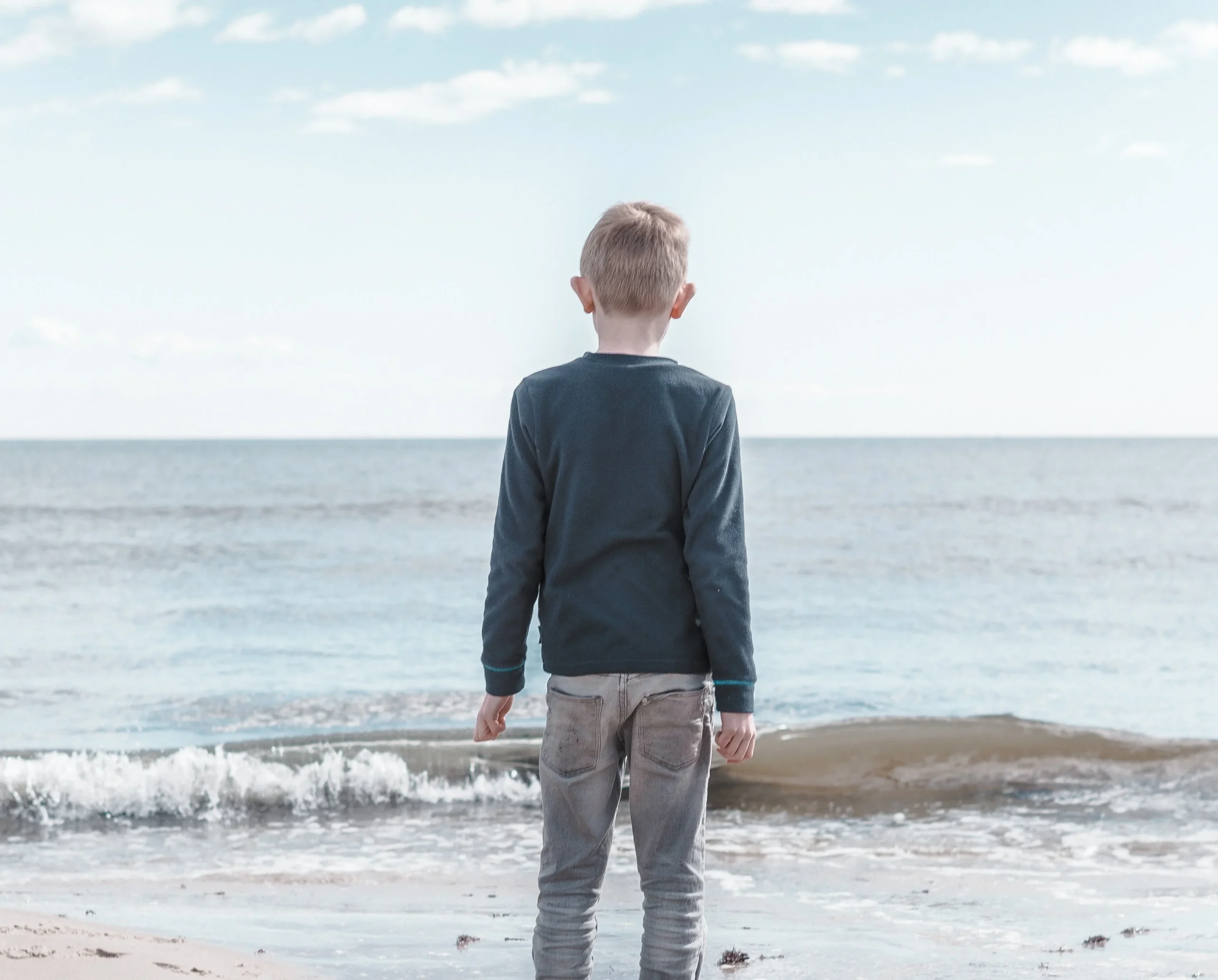 Boy By Water